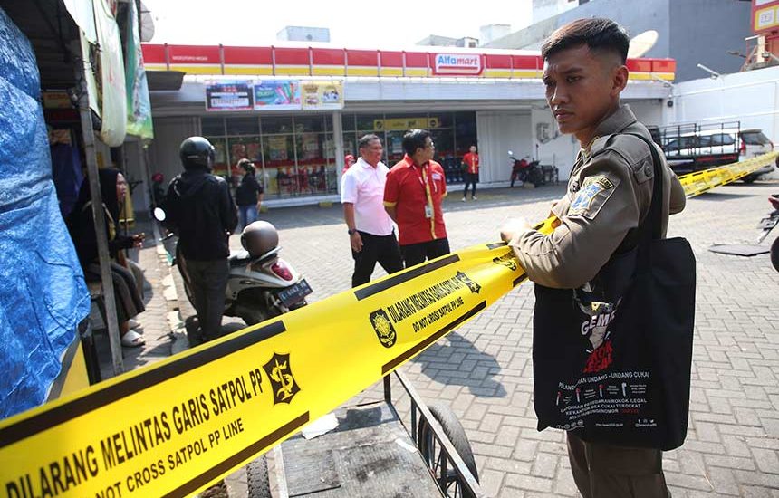 Eri Segel Lahan Parkir Toko Modern